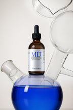 Scalp preparation science of the MD Hair Restoration Kit — mandelic acid and caffeine
